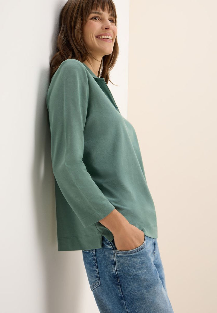 Poloshirt mit Knopfdetail
