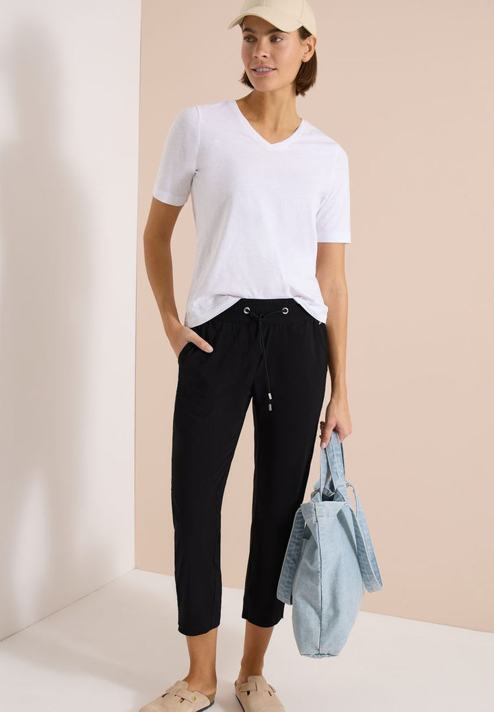 Mid Waist Slim Leg Hose im Casual Fit