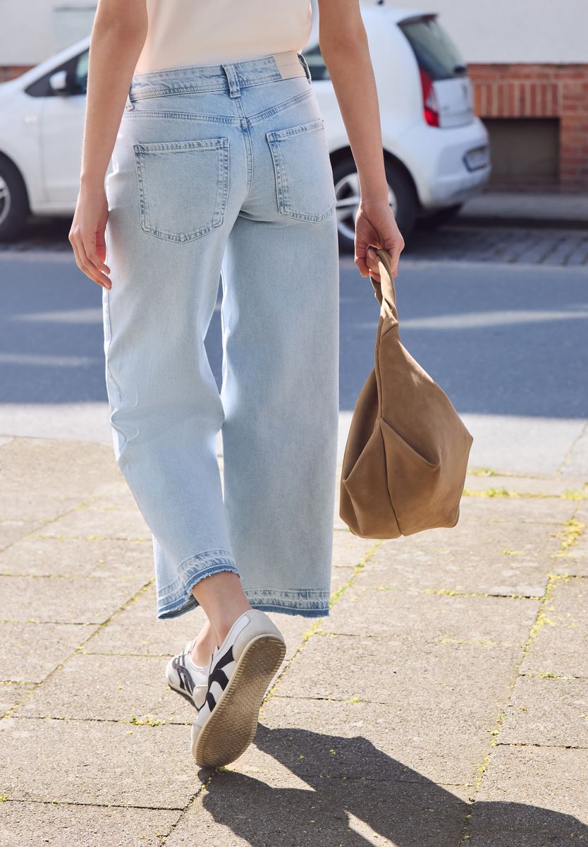 Mid Waist Wide Leg Jeans mit Ziersaum
