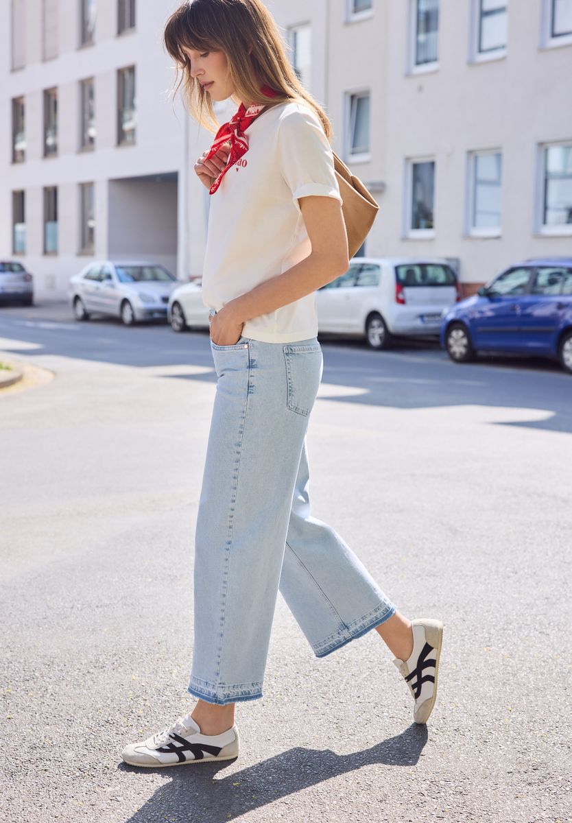 Mid Waist Wide Leg Jeans mit Ziersaum