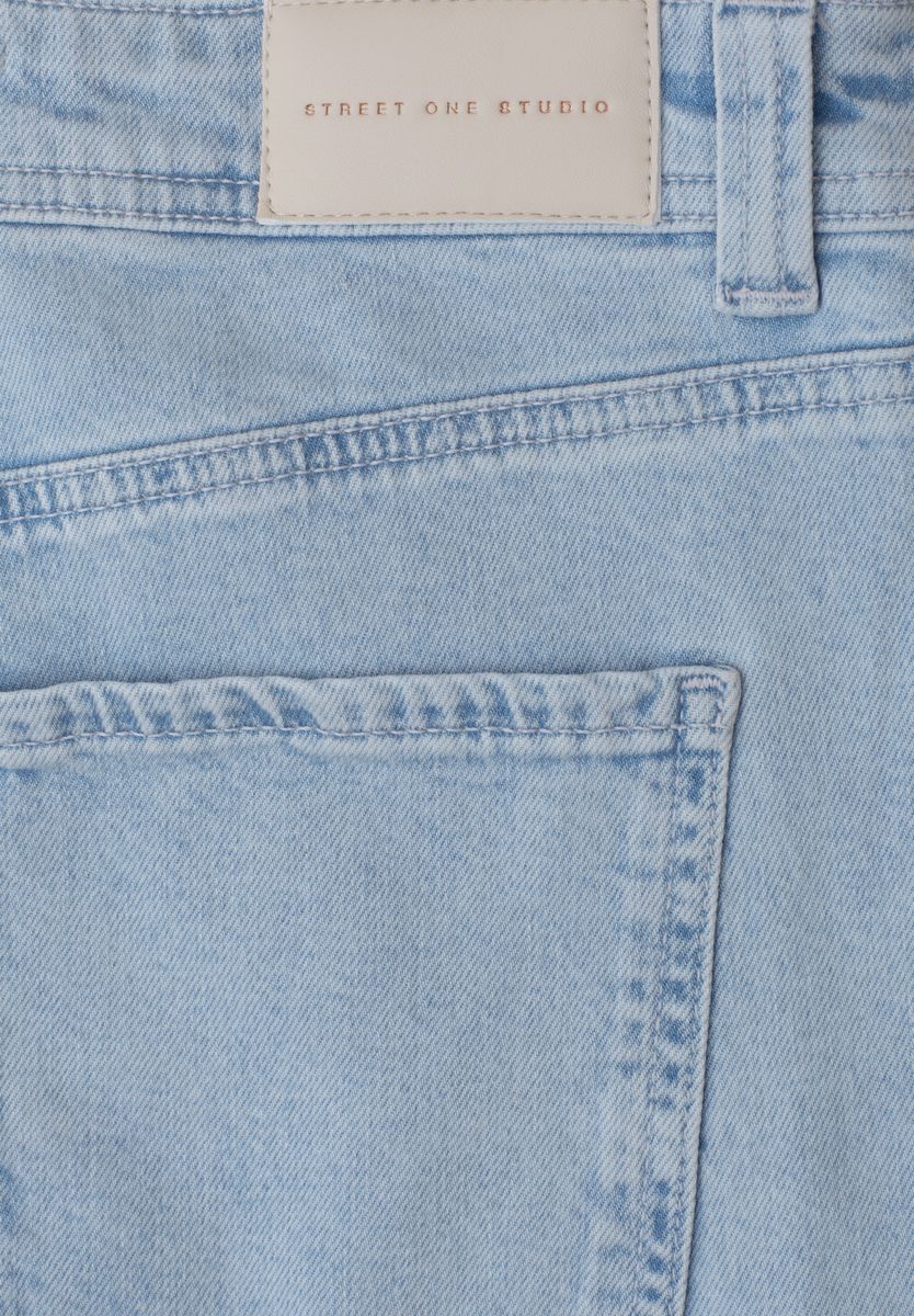 Mid Waist Wide Leg Jeans mit Ziersaum
