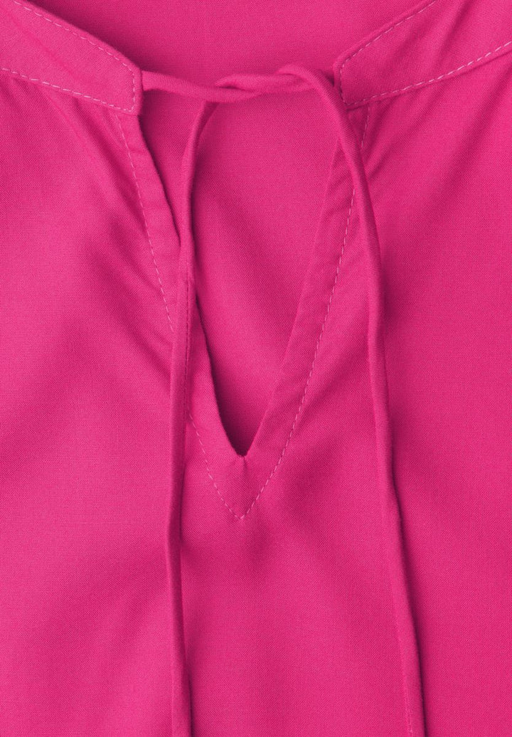 Blusenshirt mit Split Neck und Smokdetail