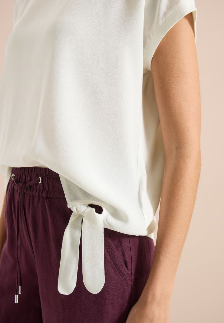Bluse mit Rundhals und Knotendetail