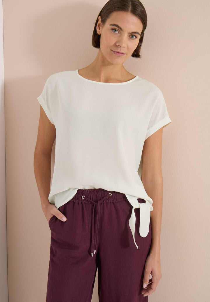 Bluse mit Rundhals und Knotendetail
