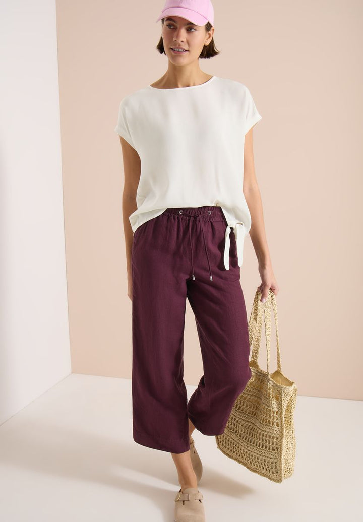 Bluse mit Rundhals und Knotendetail