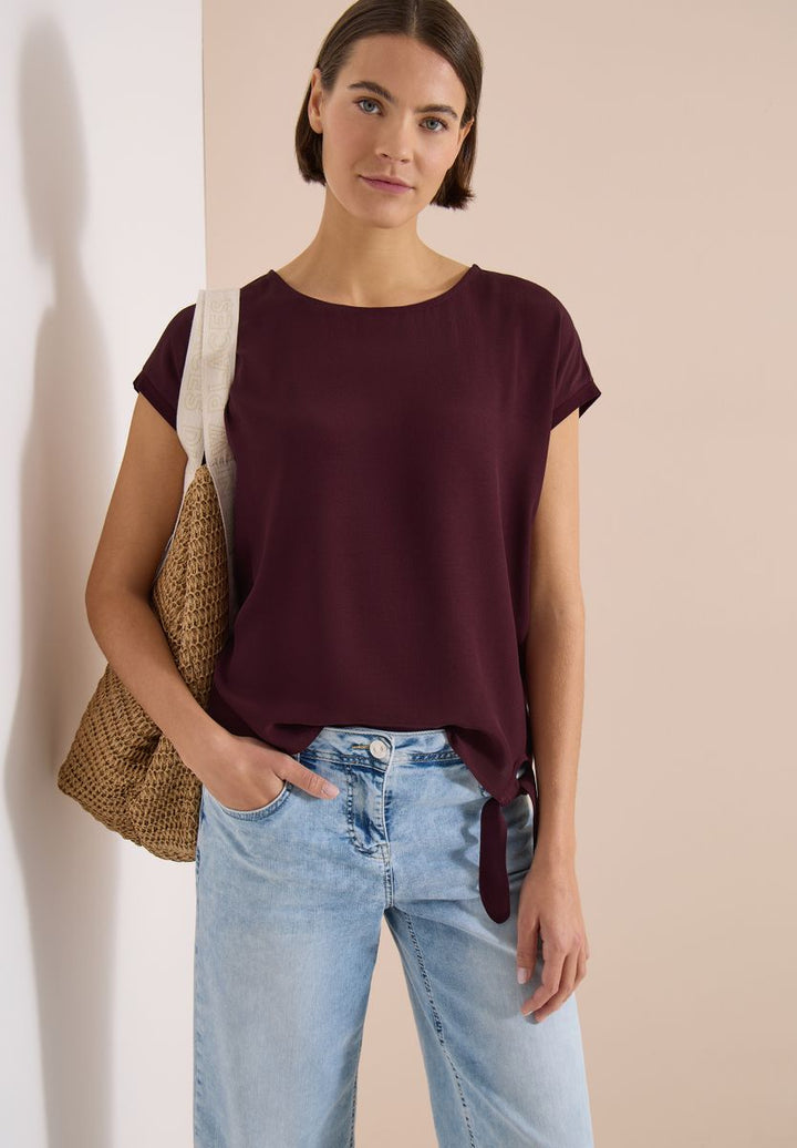 Bluse mit Rundhals und Knotendetail