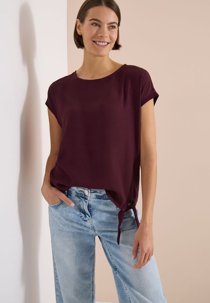 Bluse mit Rundhals und Knotendetail