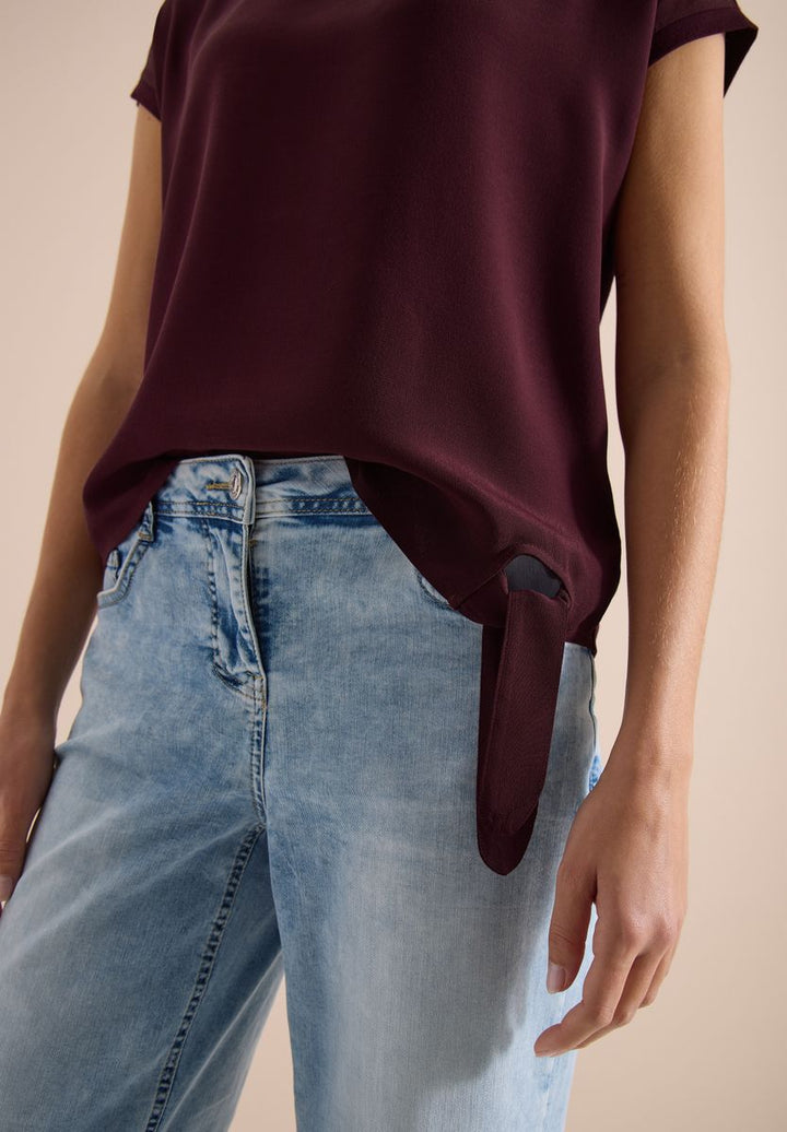 Bluse mit Rundhals und Knotendetail