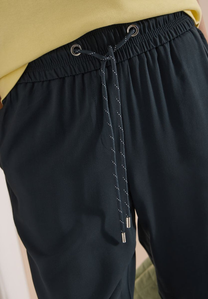 Mid Waist Slim Leg Hose im Loose Fit