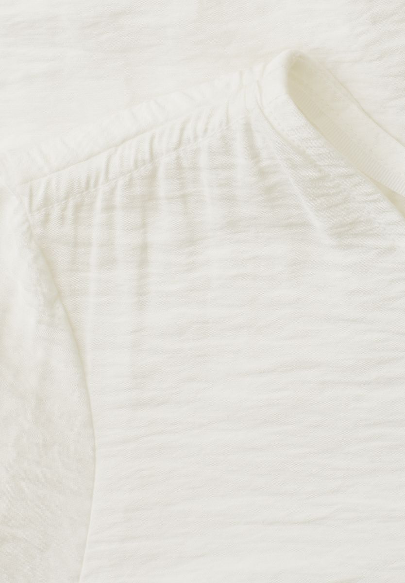 Kurzarm Bluse mit V-Neck und Schößchen