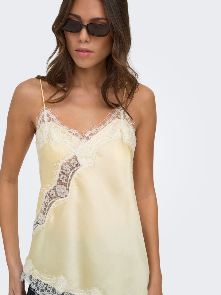 JDYFIFI S/L ASYM LACE SINGLET WVN NOOS