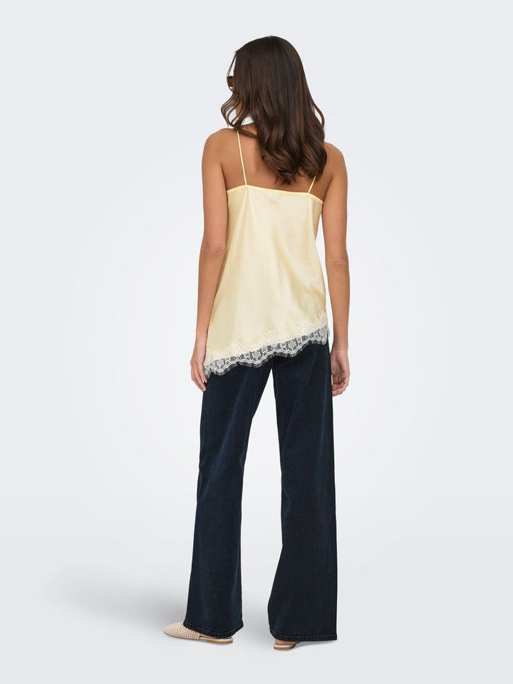JDYFIFI S/L ASYM LACE SINGLET WVN NOOS