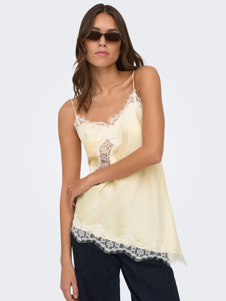 JDYFIFI S/L ASYM LACE SINGLET WVN NOOS
