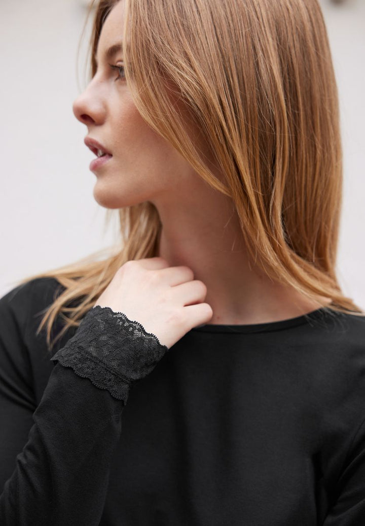 Langarm Shirt mit diagonalem Saum