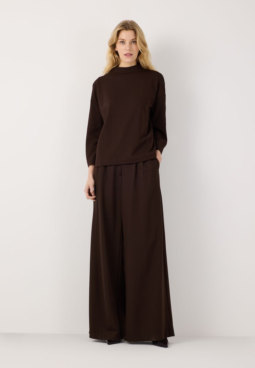 Dunkelbraune Jerseyhose mit weitem Bein