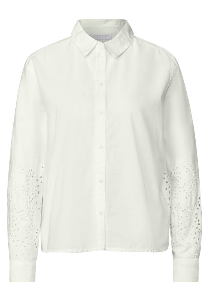 Bluse mit bestickten Ärmeln