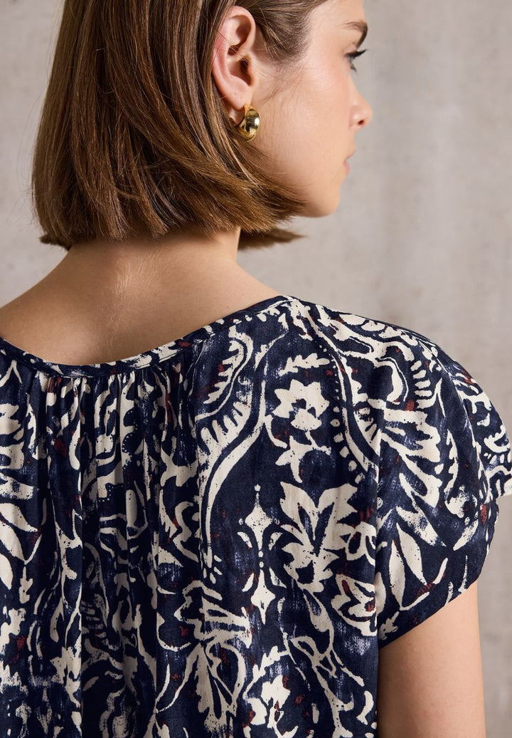 Gemusterte Bluse mit Raffung