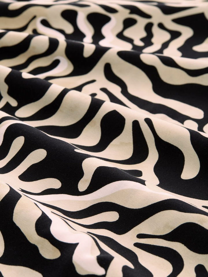 Gemustertes Midikleid in Wickel-Optik
